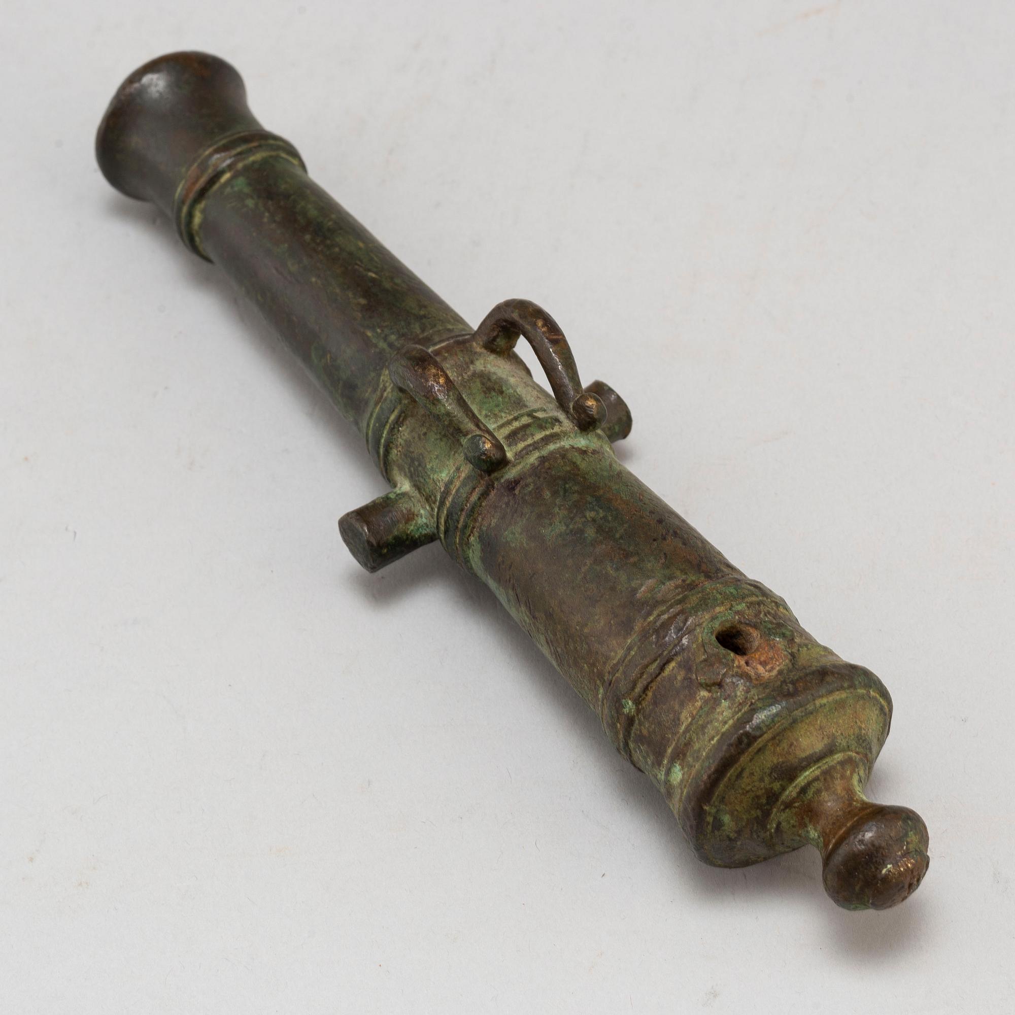 A small bronze cannon probably 19th Century.