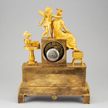 A French Empire pendulum clock, early 19th century.