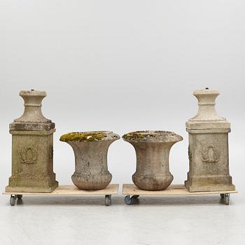 Garden urns, a pair on pedestals, 20th century.