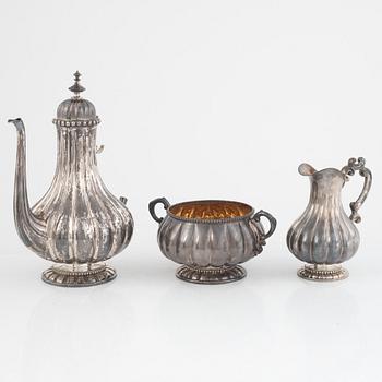 A three-piece silver coffee service by Gustaf Möllenborg, Stockholm, Sweden, 1891.