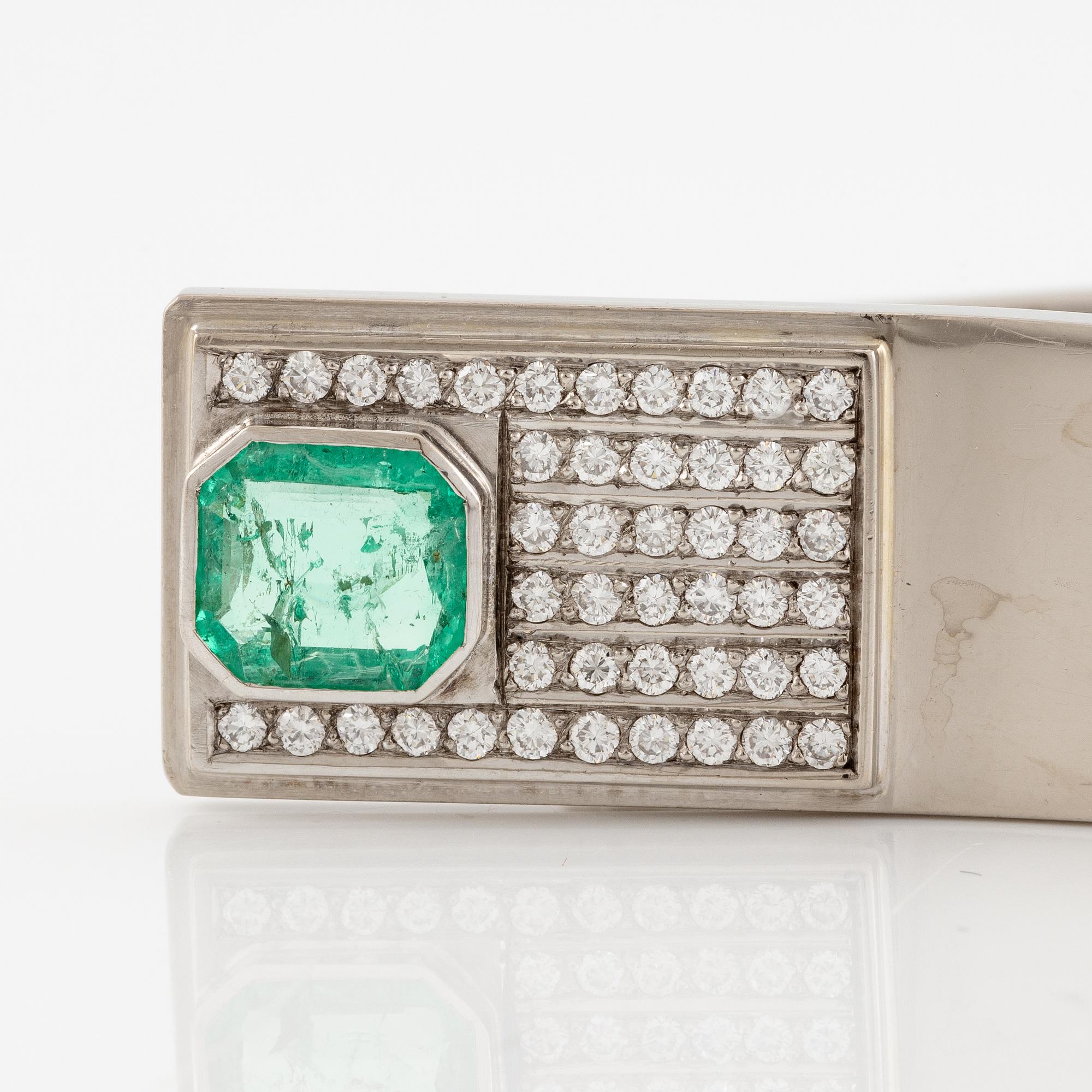 A Sigurd Persson bracelet 18K white gold with a faceted emerald and round brilliant-cut diamonds, Stockholm 1974.