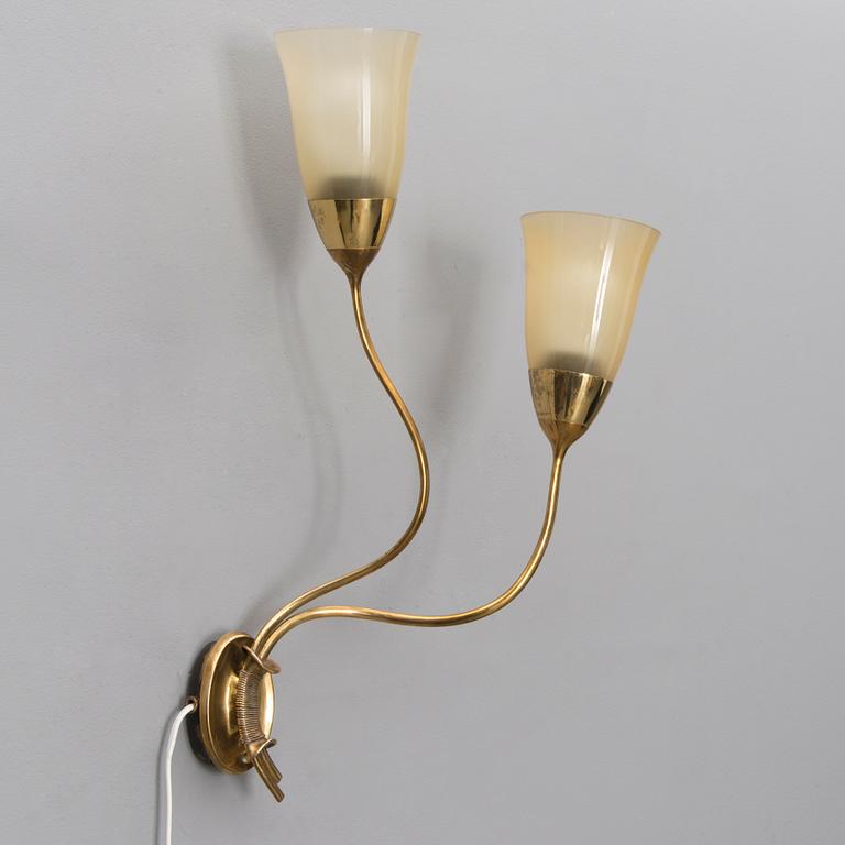 A 1940s wall light for Taito Oy, Finland.