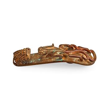 A gilt bronze belt hook, presumably Han dynasty (206 BC-220 AD).