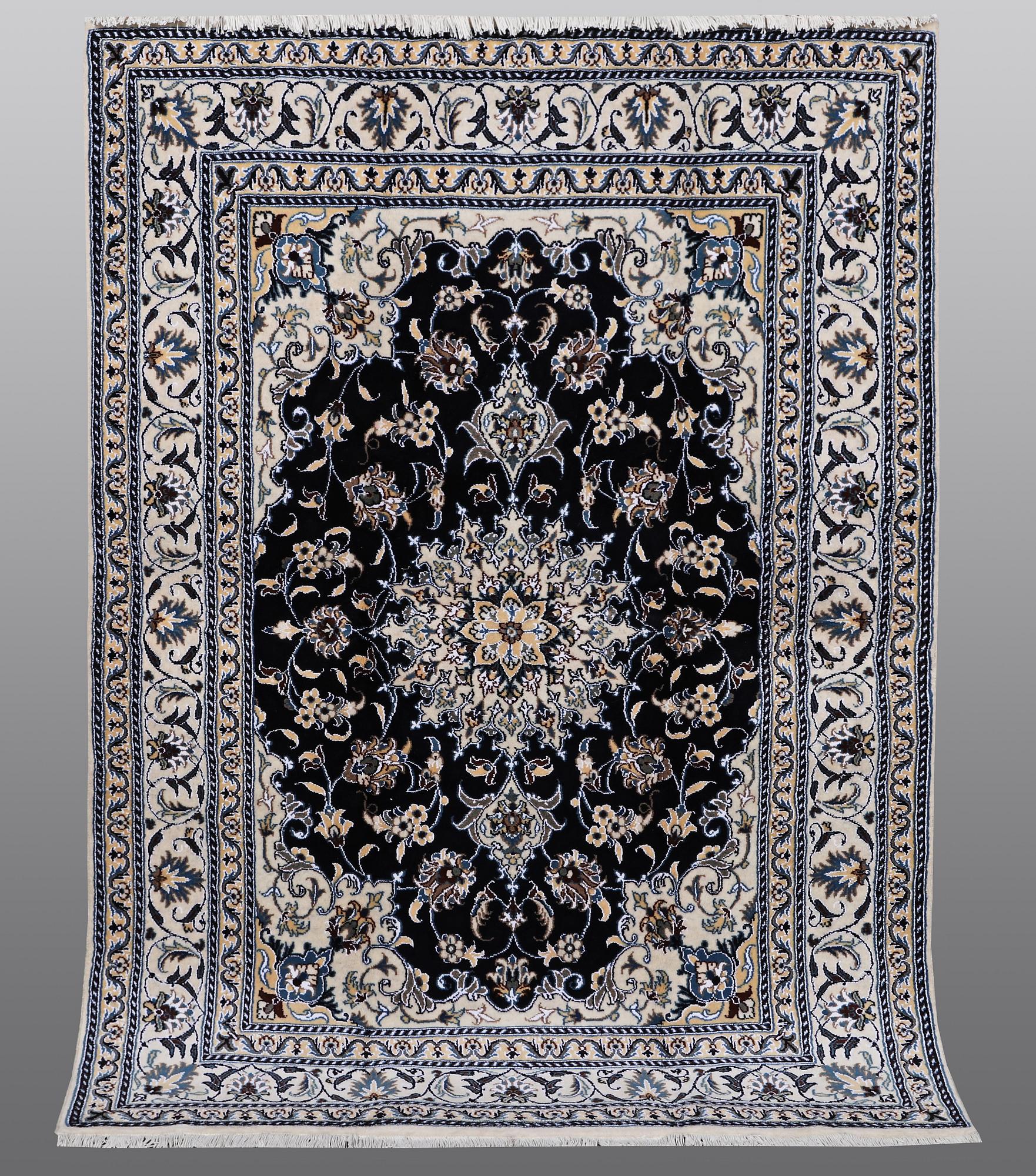 A carpet, Nain, part silk, ca 212 x 153 cm.