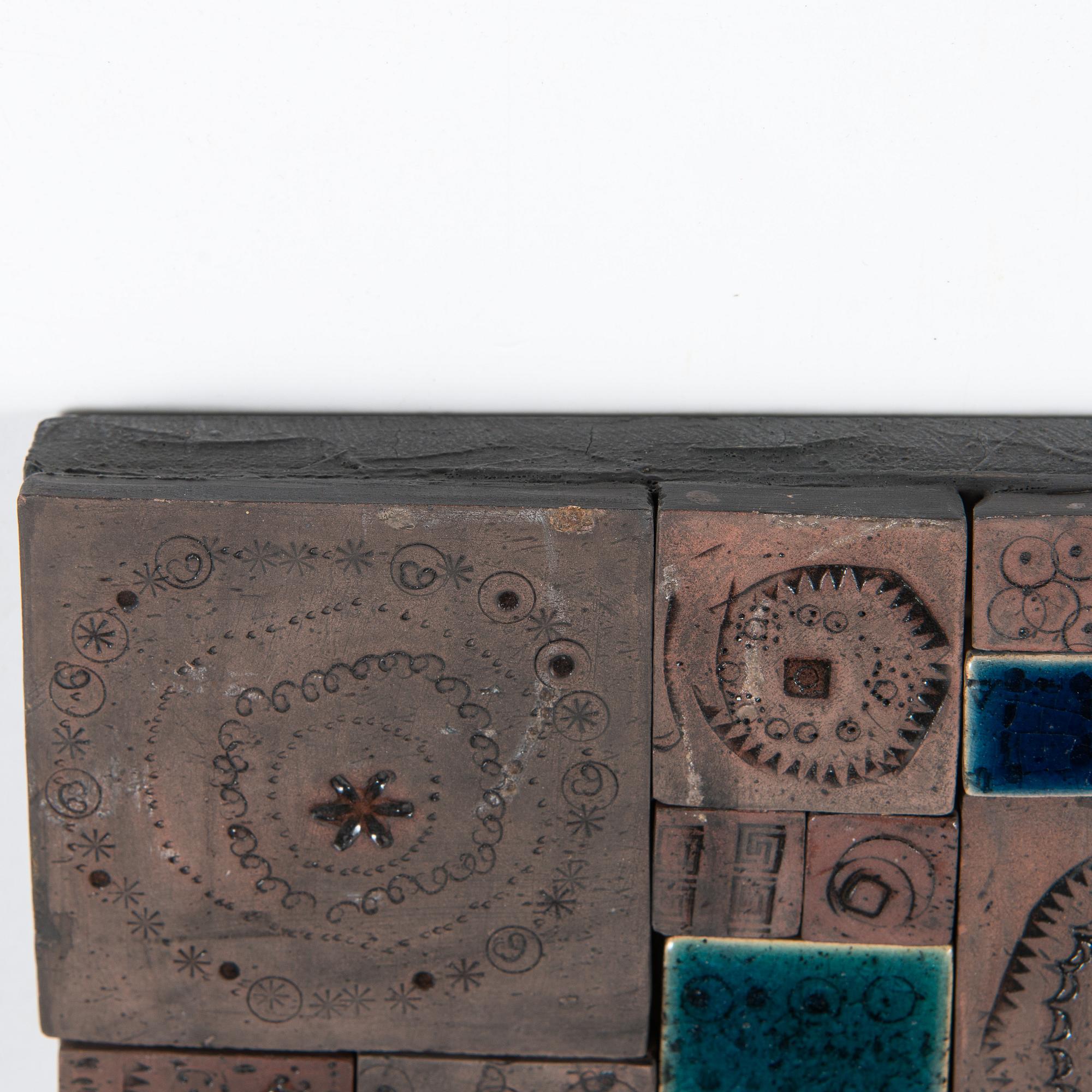 Rut Bryk, relief, signed a tergo.