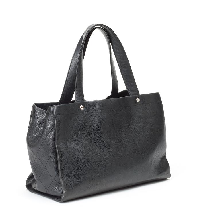 A black leather handbag by Chanel.