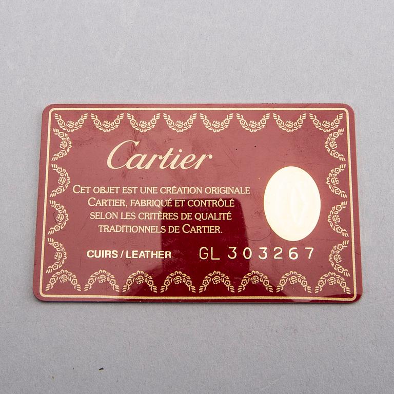 A Cartier leather briefcase.