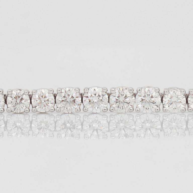 A diamond necklace, 13.09 cts accordning to engraving.