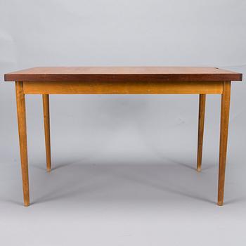 A set of four  chairs by Edsby Verken and a mid 20th century table.