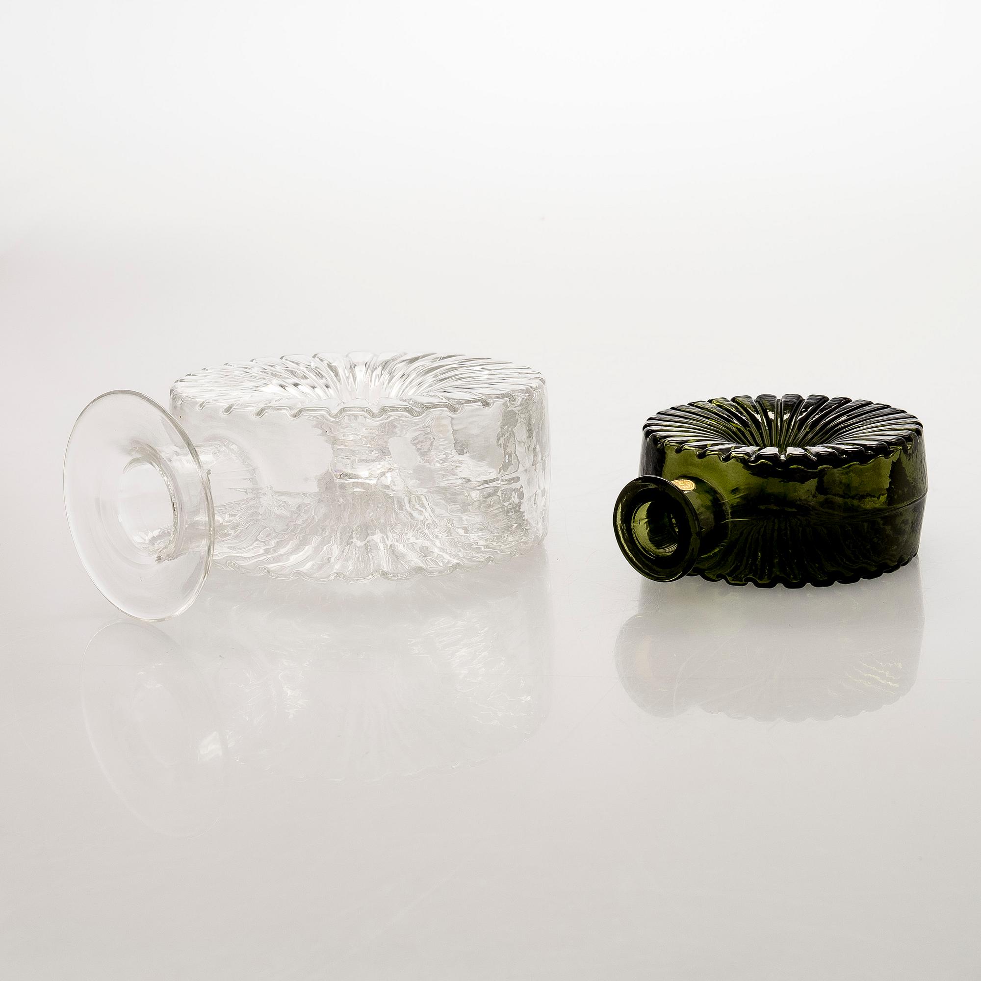 Helena Tynell, two glass 'Sun bottle' bottles for Riihimäen Lasi Oy. In production 1964-1974.