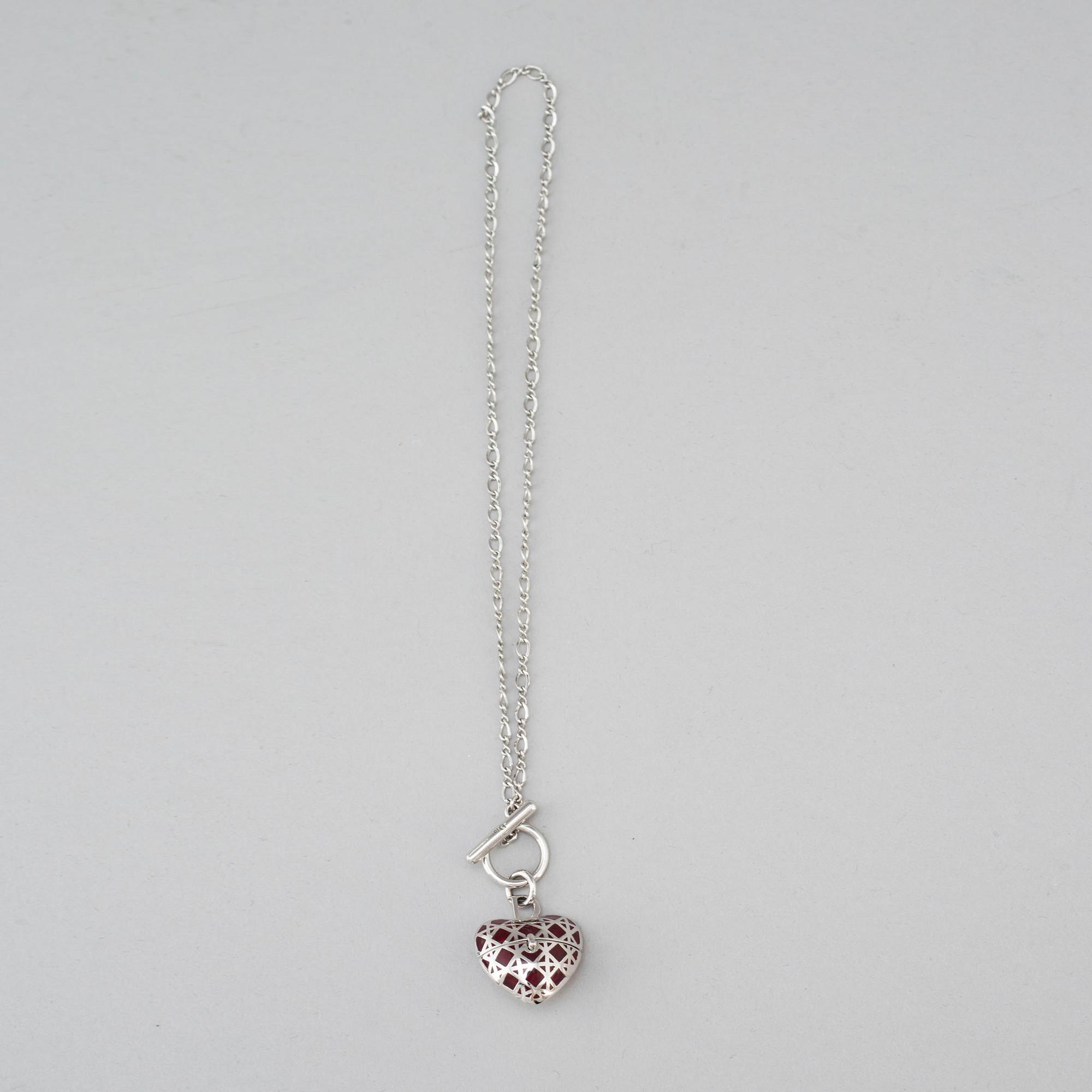 A Christian Dior costume jewelry pendant.