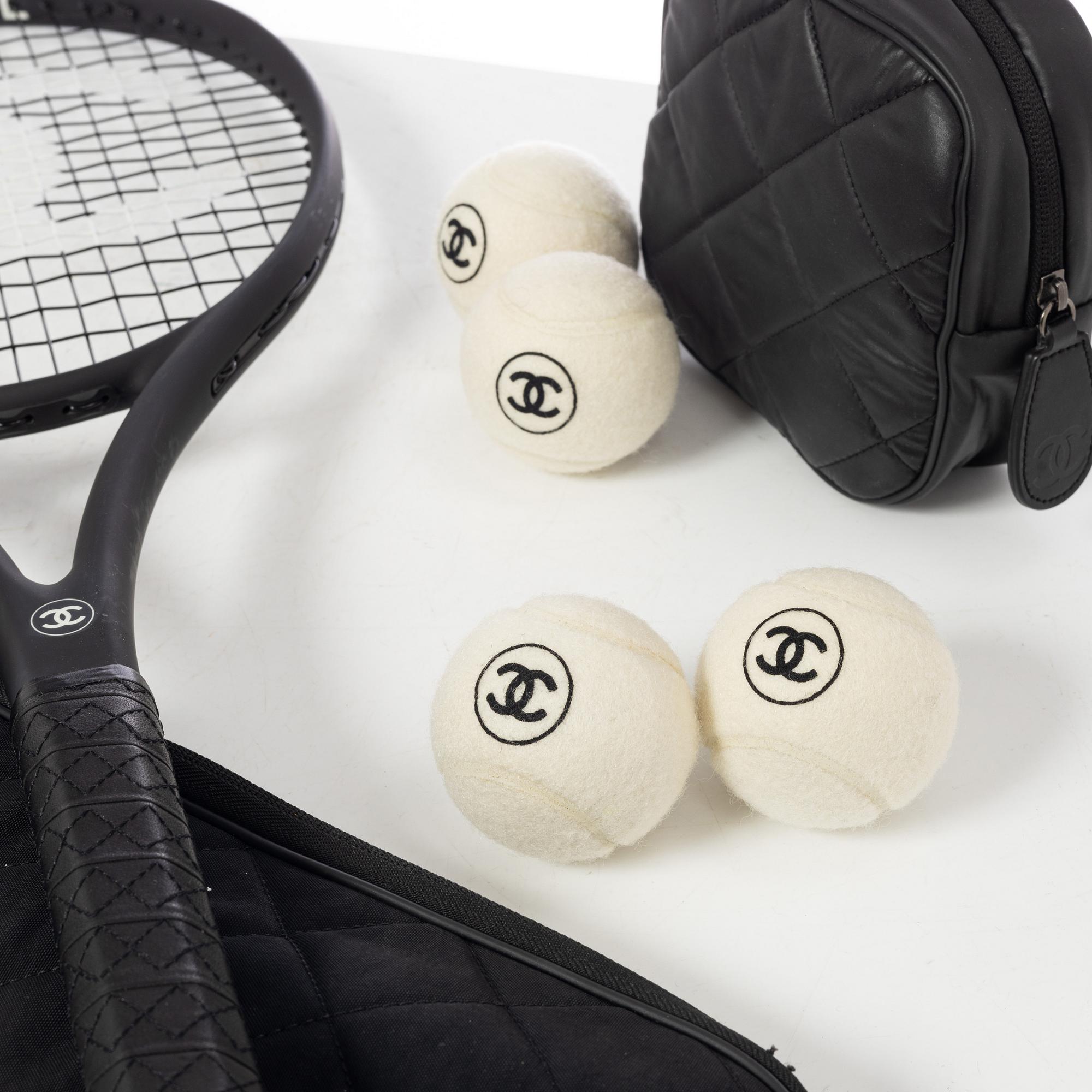 Chanel, tennis racket and 4 balls with case.