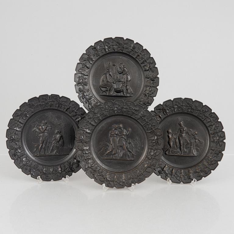 Four decorative plates, later part of the 20th century.