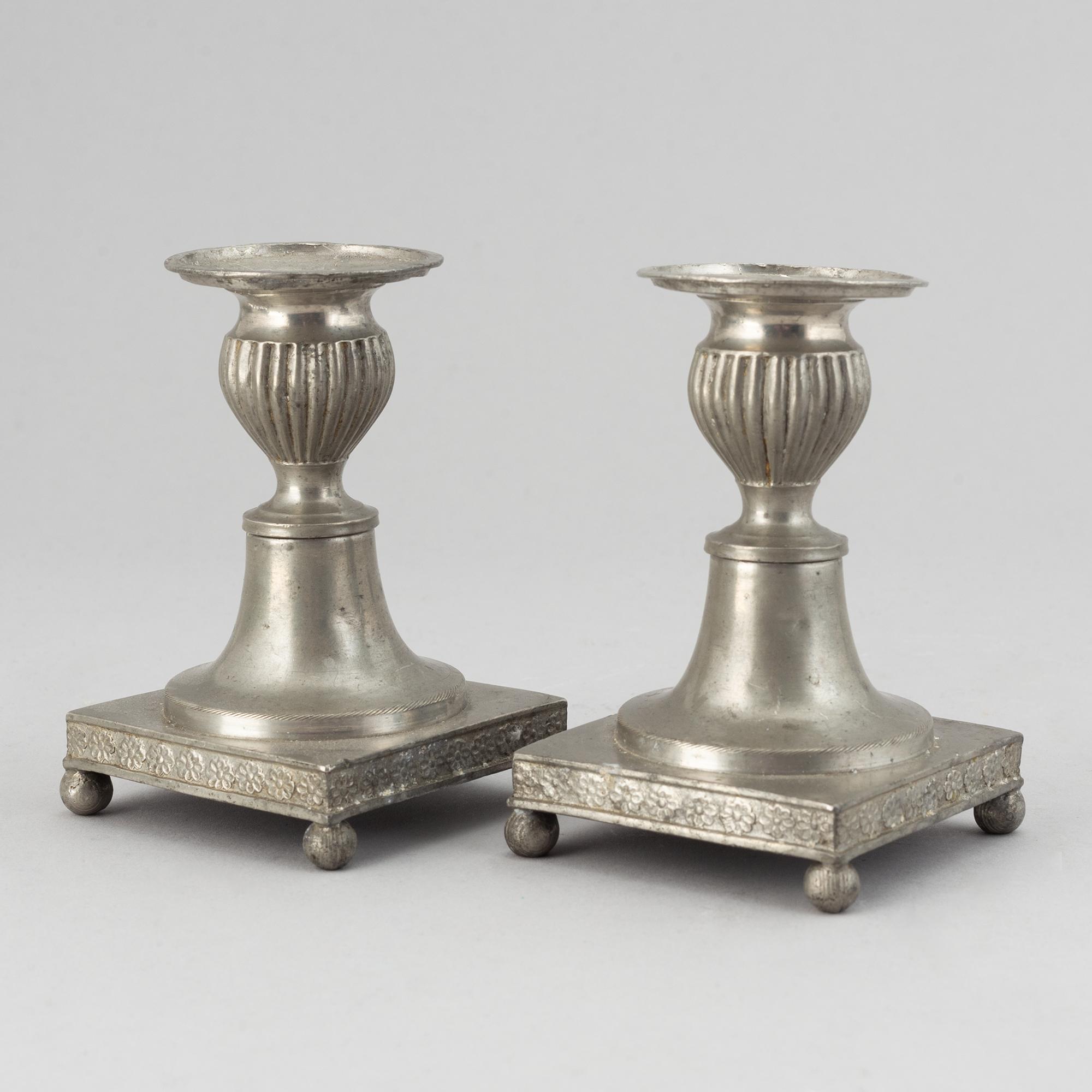 A pair of pewter candlesticks by Niclas Anström, Växjö 1835.