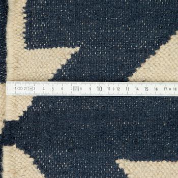 A carpet flat weave, c 272 x 170 cm.