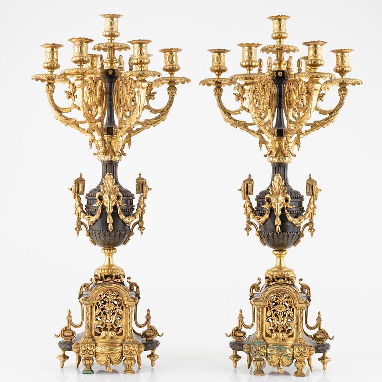 A pair of bronze candelabra, late 19th Century.