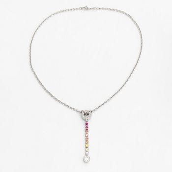 An 18K whitegold necklace with a diamond ca 1.01 ct, smaller diamonds tot. ca 0.15 ct, ruby and 
sapphires, Helsinki.