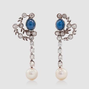 1242. A pair of cultured pearl, sapphire and diamond earrings. Total carat weight of diamonds circa 2.90 cts.