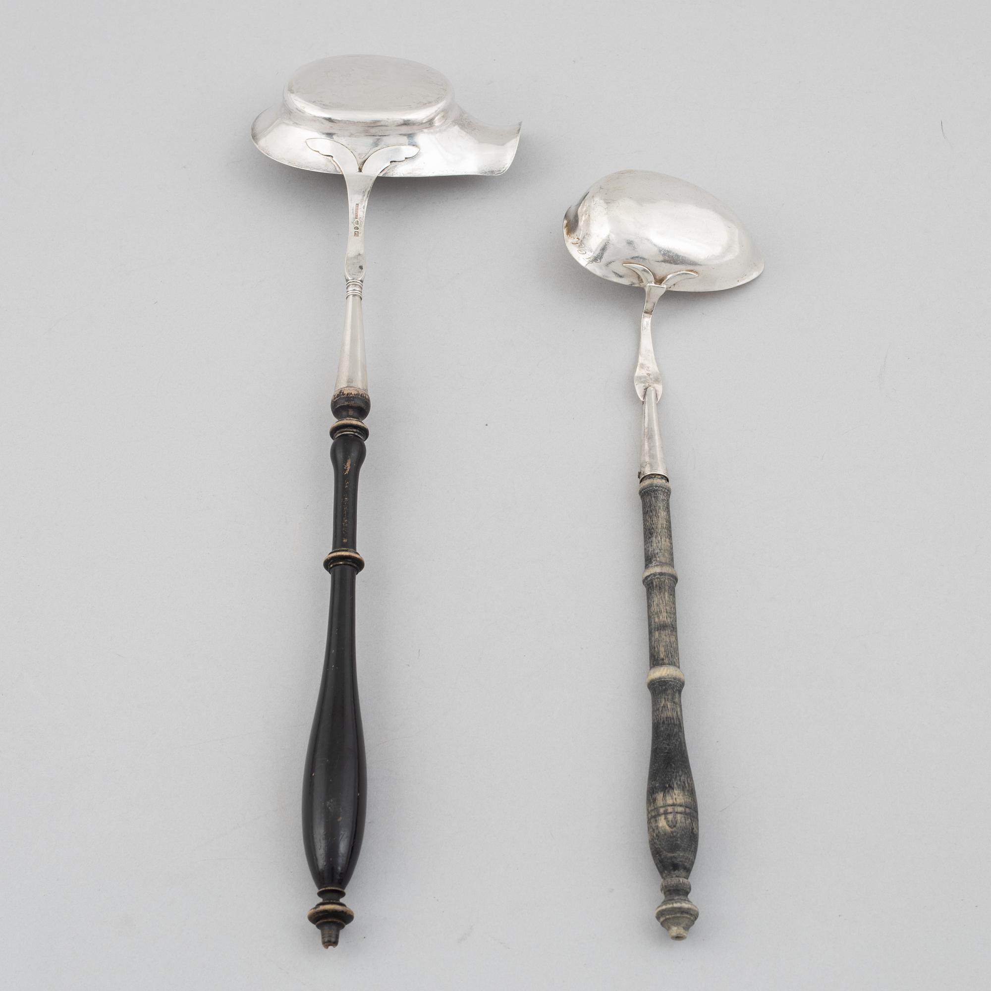 Two Swedish silver soup ladles, 19th Century.