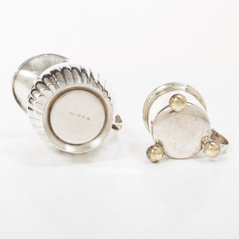Sugar tongs, cream jug and miniature decanter, silver, including CG Hallberg, Stockholm 1955.
