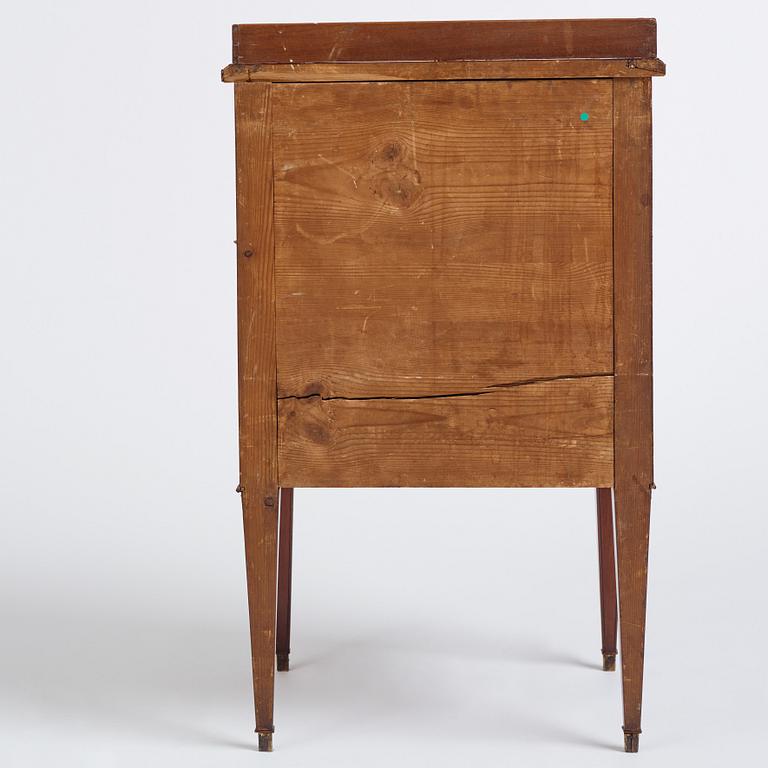 A late Gustavian mahogany-veneered chamberpot cupboard, circa 1800.