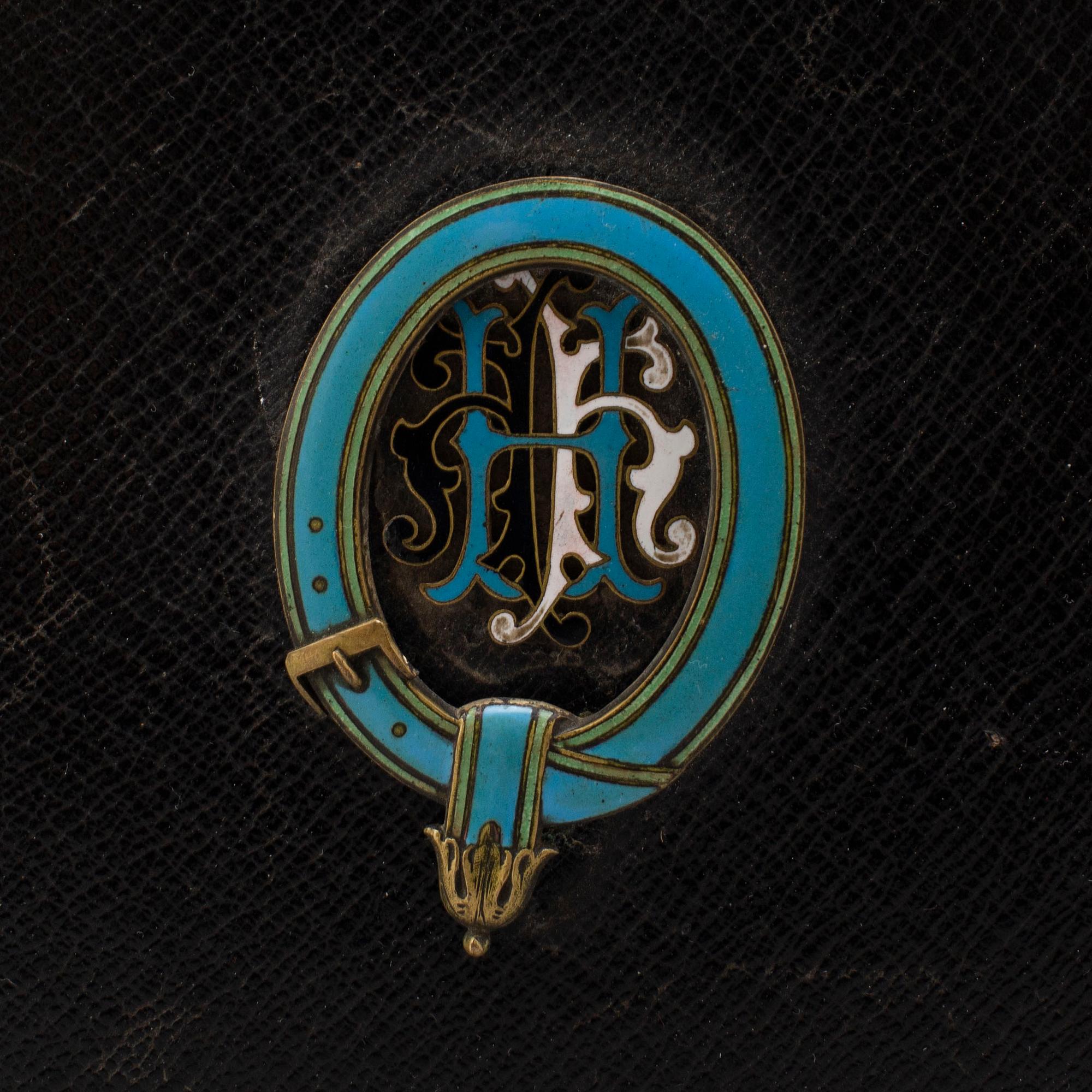 A PHOTO ALBUM, ca 150 photos, secod half of the 19th century.