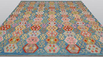 A Kilim carpet, approx. 301 x 252 cm.