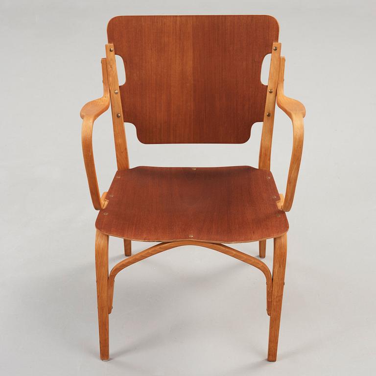 A Carl-Axel Acking beech and mahogany armchair, Svenska Möbelfabrikerna, Bodafors 1940's.