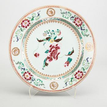 A Chinese Qianlong porcelain plate and dish in famille rose colours.