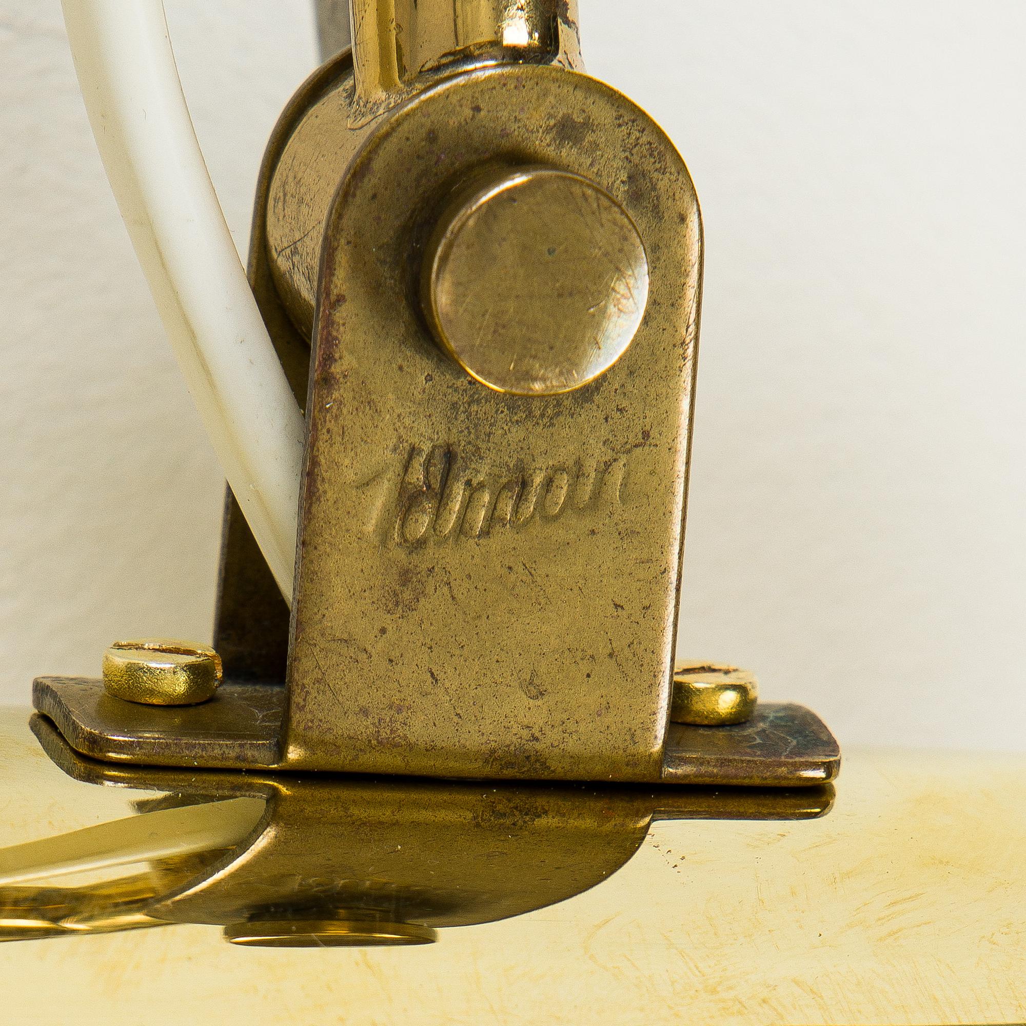 Paavo Tynell, a brass wall light model 9459, Idman, Finland 1960s.