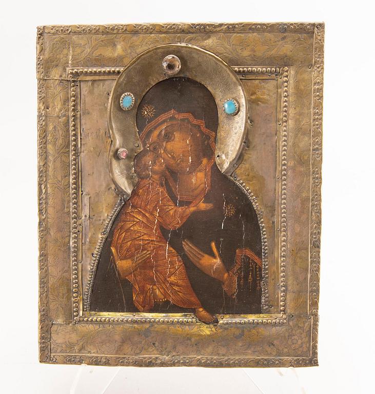 A 19th century Russian icon with brass risa.