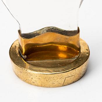 Estrid Ericson, attributed to, a brass and glass sculpture for exposing rings at Svenskt Tenn, 1950-1960s.