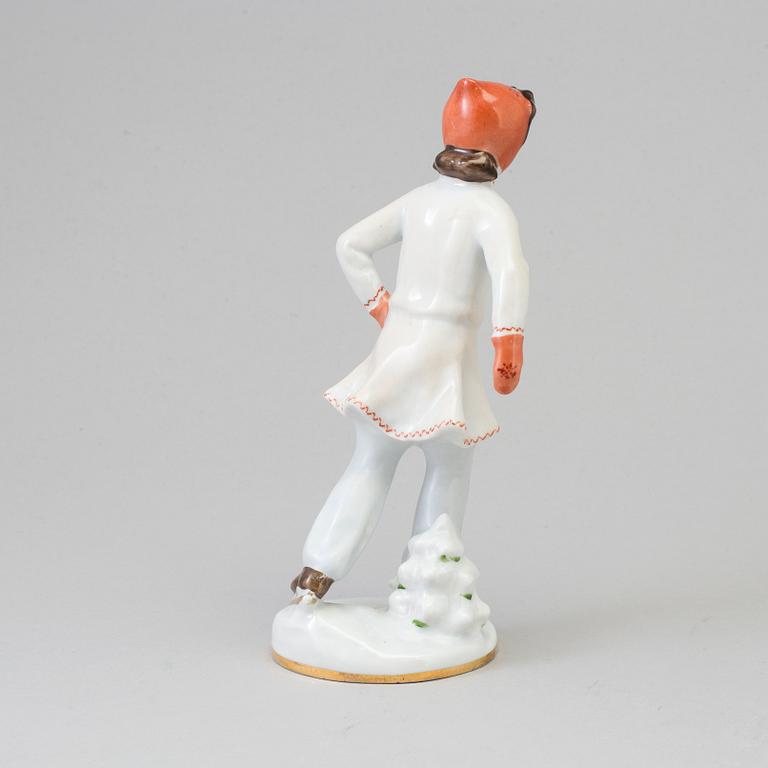 A early 20th century porcelain figurine from Russia.