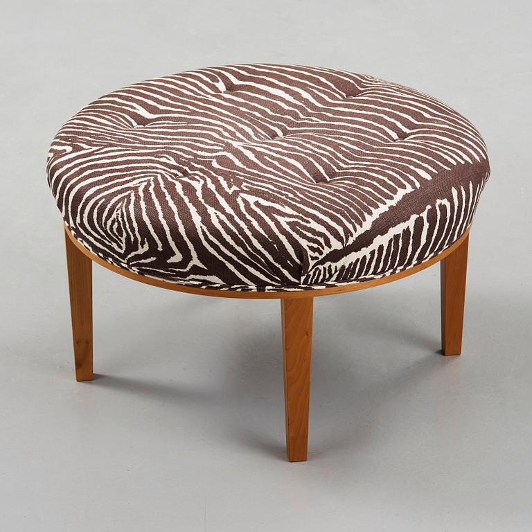 A Josef Frank mahogany stool, model 647, by Svenskt Tenn, Sweden.