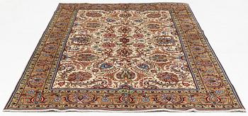 A Tabriz carpet, 309 x 205 cm.