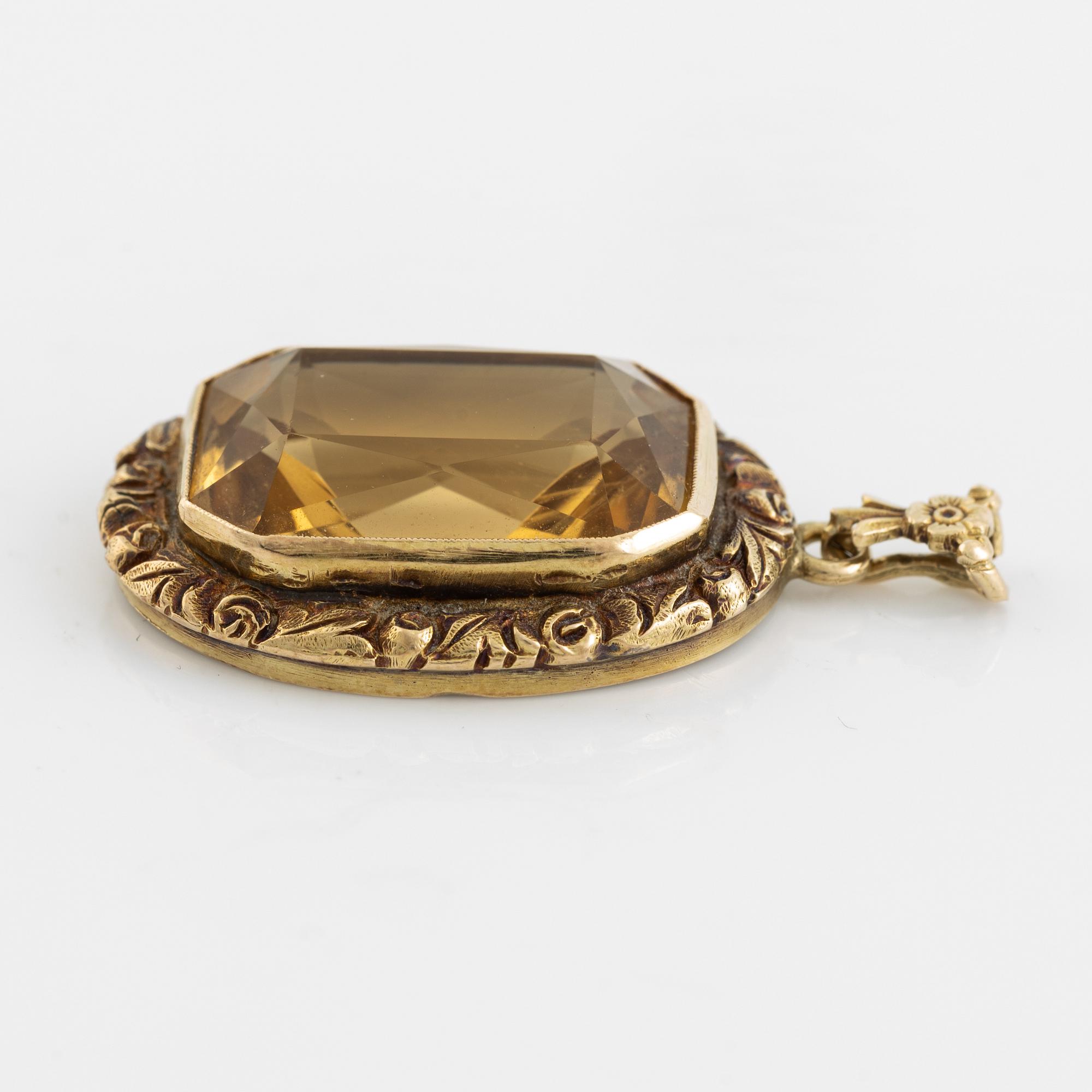 Gold and citrine pendant.