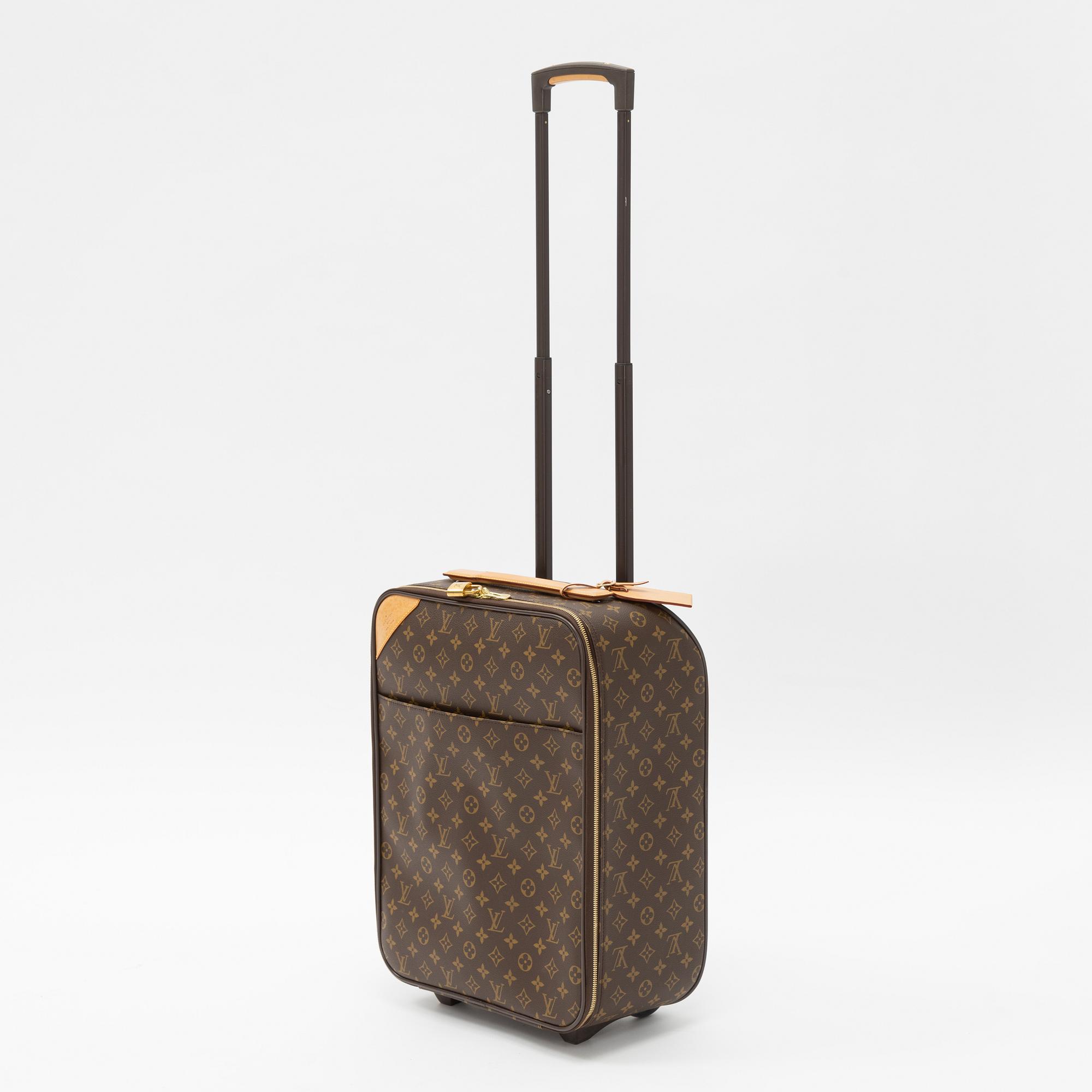 Louis Vuitton, a monogram canvas 'Pégase 50' suitcase, 203.