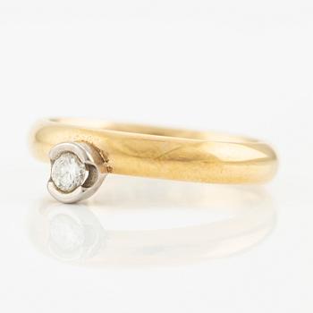 Ring in 18K gold with a round brilliant-cut diamond.