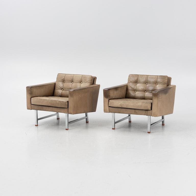 Karl Erik Ekselius, a pair of leather armchairs, JOC, Sweden, 1960's/70's.