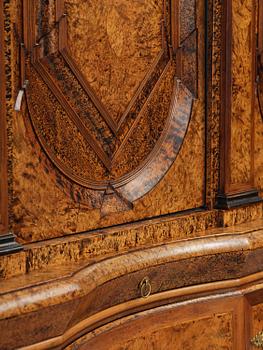 A Swedish late baroque burr-alder cabinet, first part 18th century.