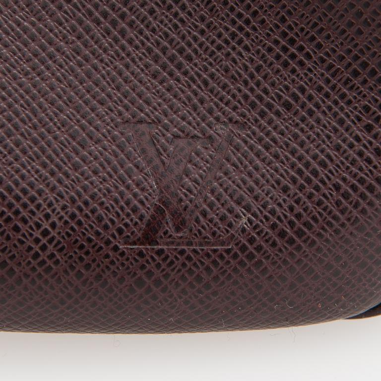 Louis Vuitton, 'Taiga Kendall PM' Bag.