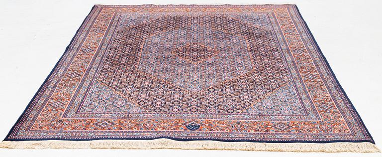 A carpet, oriental, approx. 302 x 210 cm.