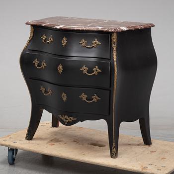 A mid 20th Century rococo style chest of drawers.