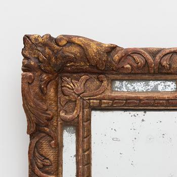 A Baroque mirror, France, 18th Century.