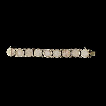 ARMBAND, förgyllt silver och polerad kalksten, Karl Meyer, Stockholm, 1897.