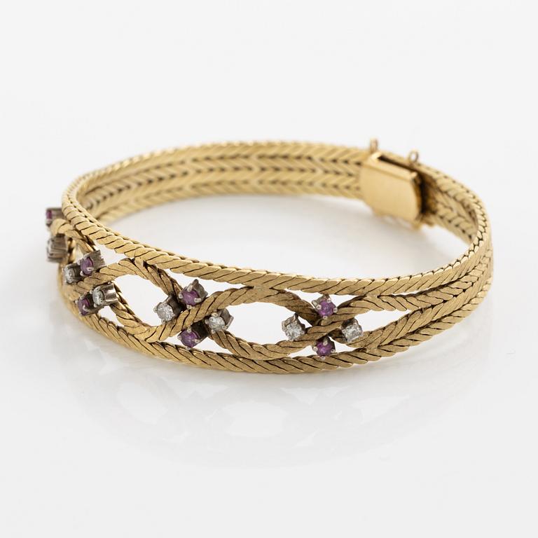 Bracelet 18K gold with diamonds and rubies.