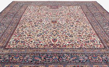 A carpet, semi-antique, Mashad/Moud, ca 431 x 324 cm.