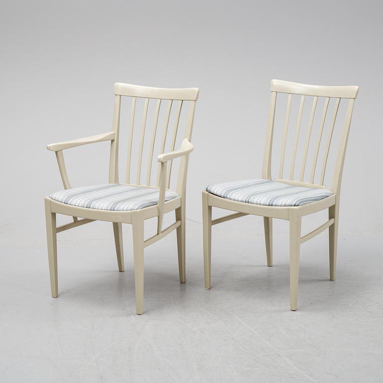 A dining table with two armchairs and six chairs by Carl Malmsten for Bodafors.