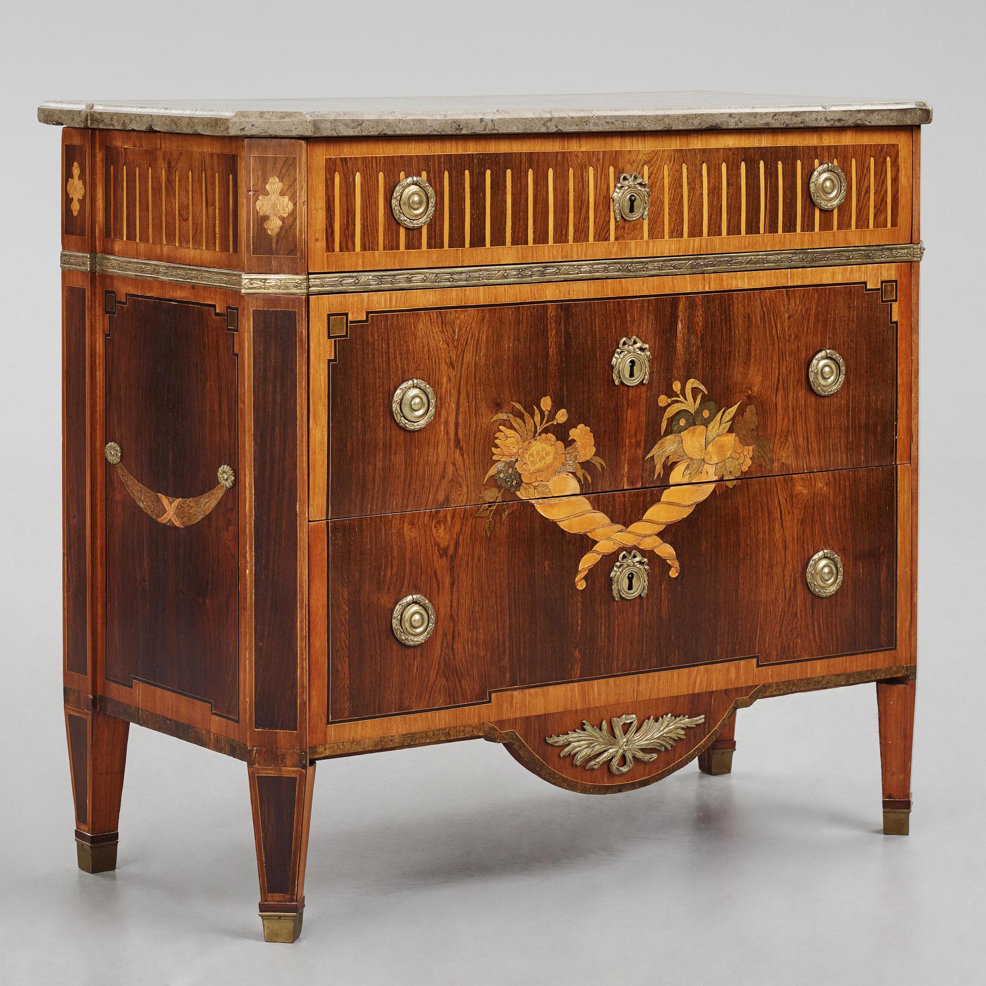 A Gustavian marquetry commode by G. Foltiern (master in Stockholm 1771-1804).