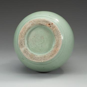 A celadon glazed vase, Qing dynasty, 18th Century.